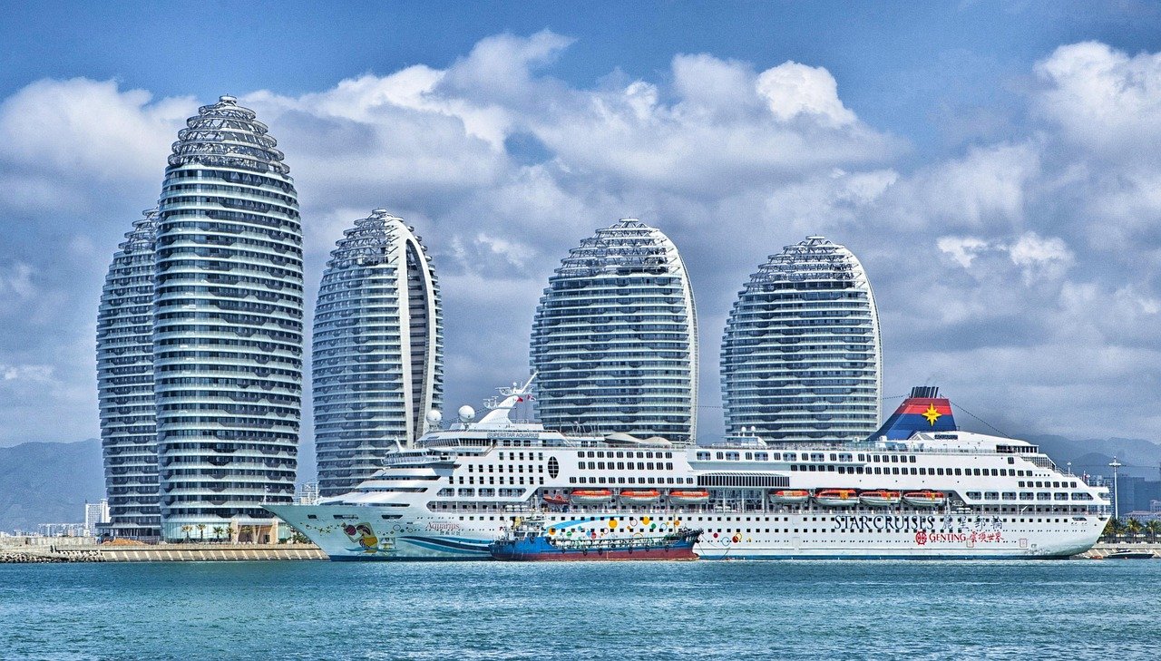 ship, city, harbor, port, bay, water, skyscrapers, hotels, modern buildings, buildings, island, nature, phoenix island, urban, skyline, ocean liner, passenger ship, cruise ship, superstar aquarius, sanya bay, hainan, china
